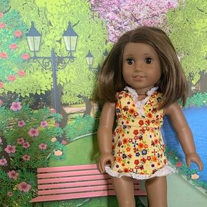 American Girl doll yellow floral swimsuit.